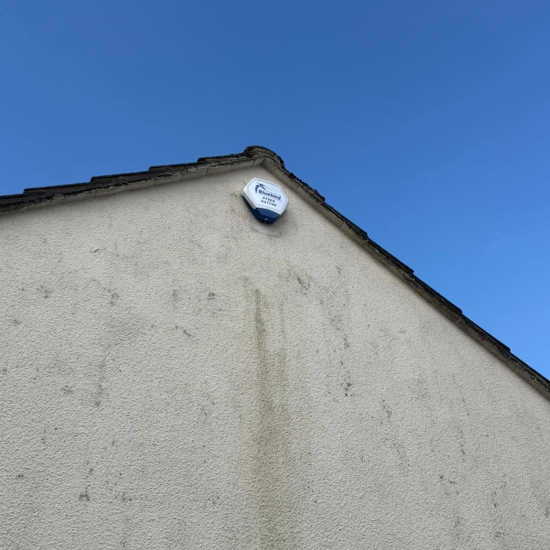 Bluebird Security external alarm sounder installed on a residential property