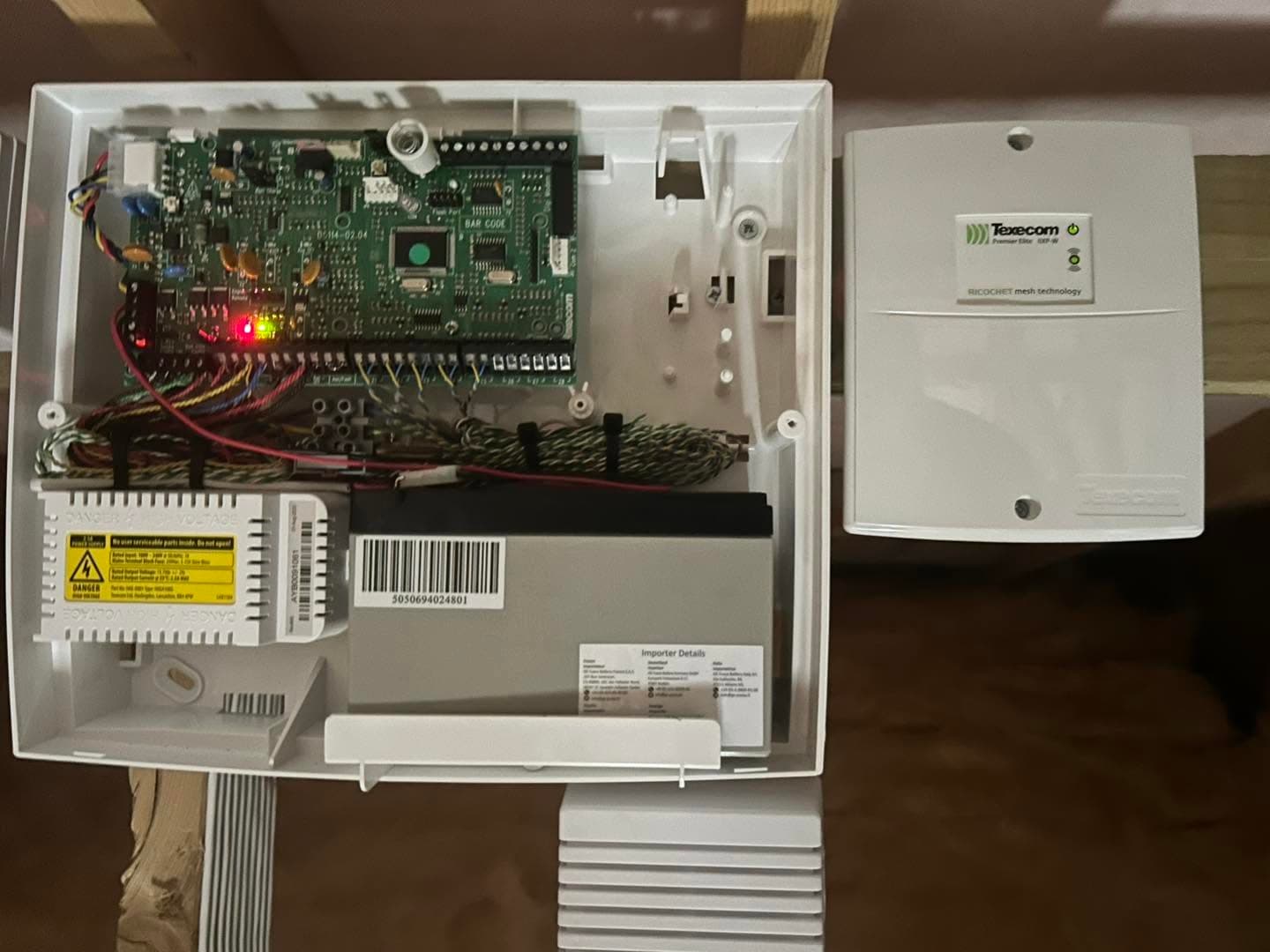 Texecom Premier Elite alarm panel and connected equipment during installation